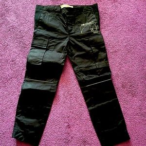 Off white pants; can un zip knee area to turn into shorts as well.